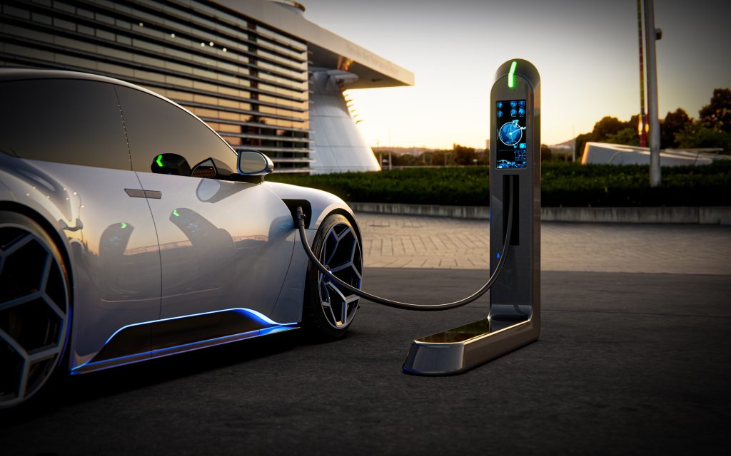 Vehicle at charging station at night for cheaper rates